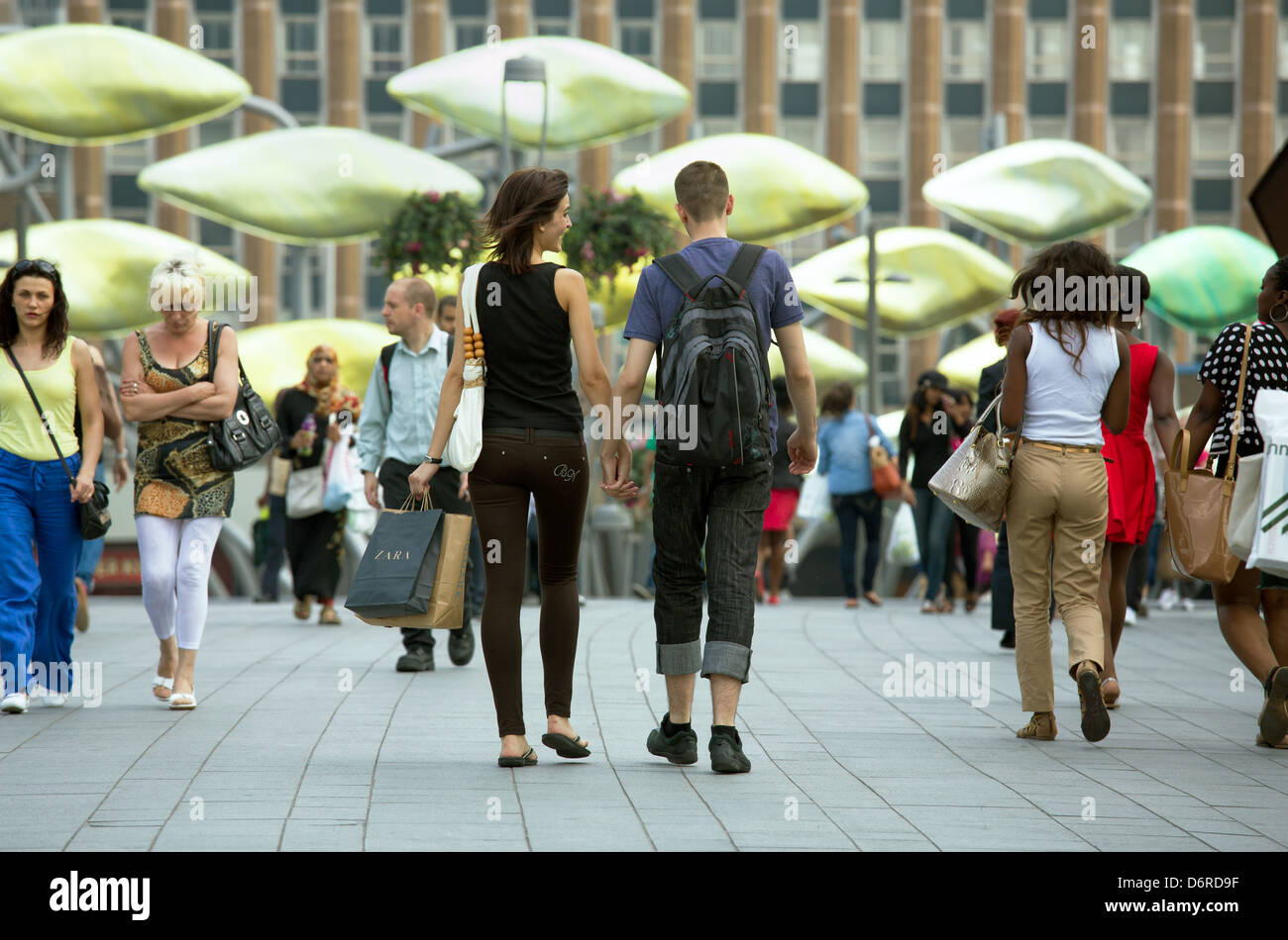 London, UK, passersby on a place in the Stratford district in the East End of London Stock Photo