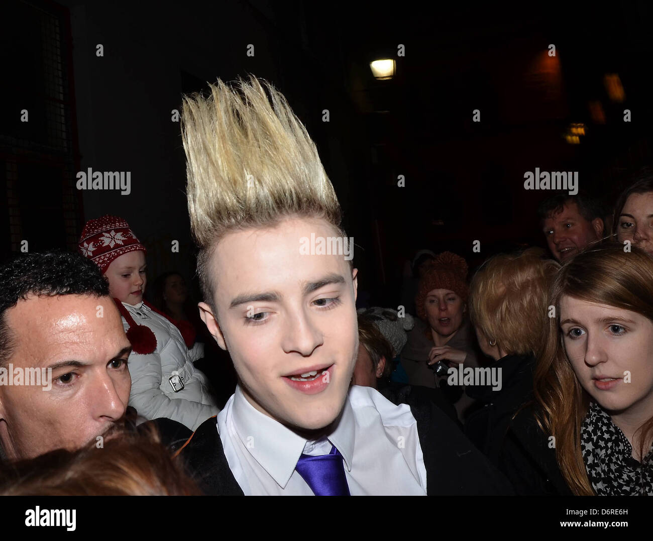 Jedward drive their fans wild when they appeared at the window and Stage Door of The Olympia Theatre at the opening night of Stock Photo