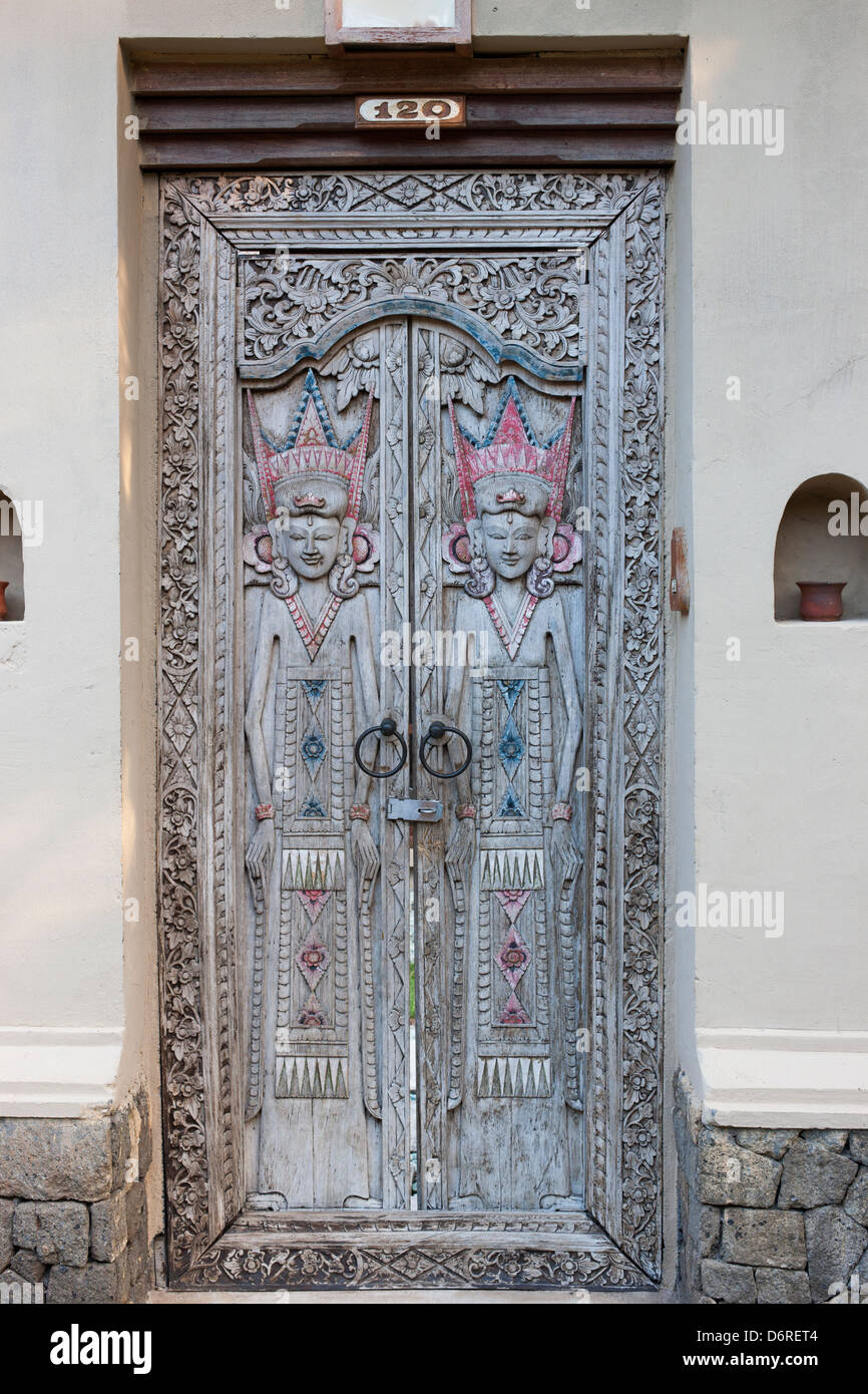 Hand carved wooden doors at the Mimpi Resort Menjangan in Bali, Indonesia  Stock Photo - Alamy