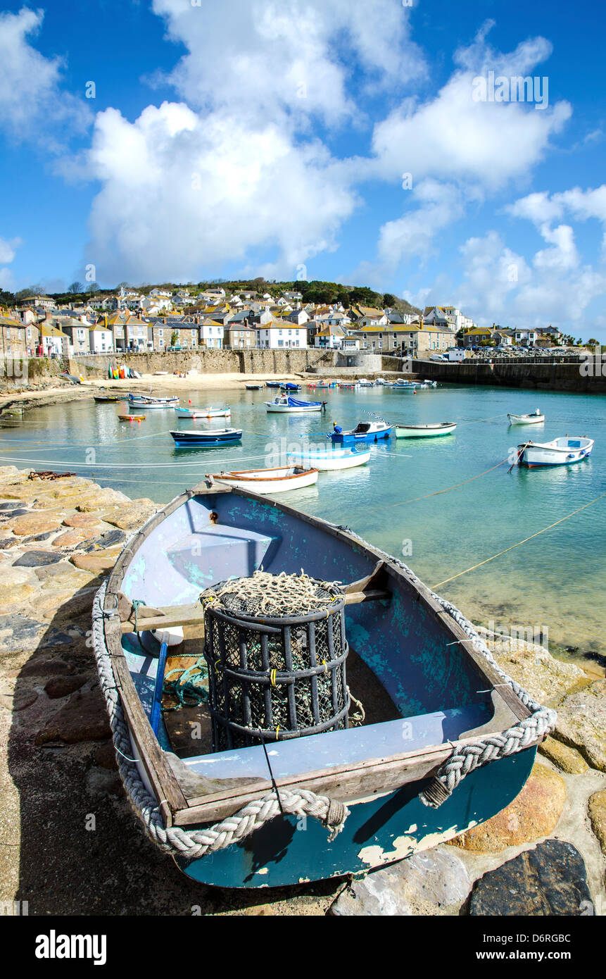 Fishing boats in the harbour at Mousehole, Cornwall, UK Stock Photo