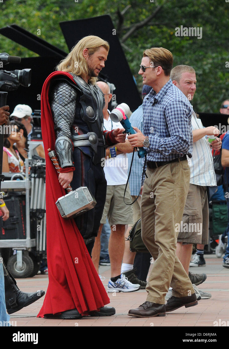 Chris Hemsworth and Chris Evans on the film set of 'The Avengers', shooting on location in Manhattan New York City, USA - Stock Photo