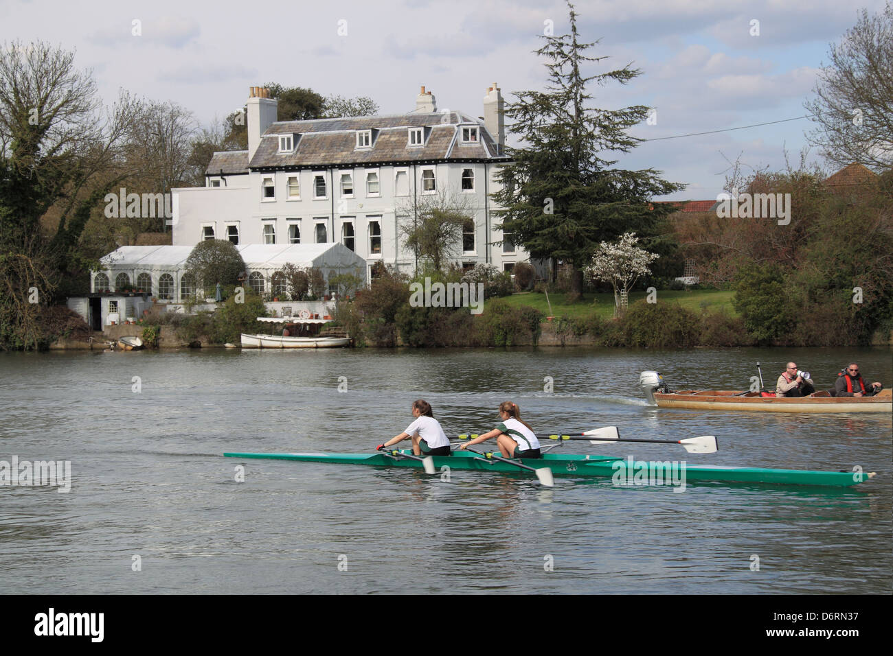 Young rowers train on the Thames, Sadlers Ride, Hurst Park, East Molesey, Surrey, England, Great Britain, United Kingdom, UK Stock Photo