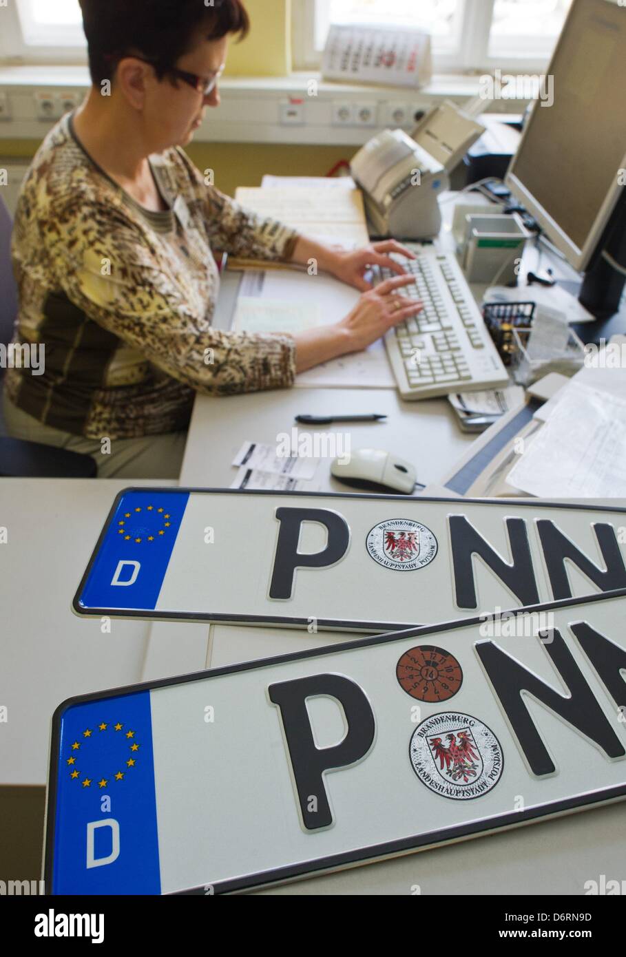 Employee Silvia Ziehe works at the vehicle registration office in