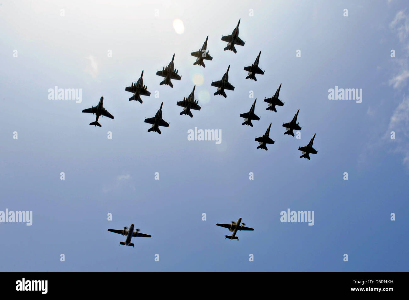 US Navy aircraft from the aircraft carrier USS John C. Stennis fly in formation April 23, 2013 in the Pacific Ocean. Stock Photo