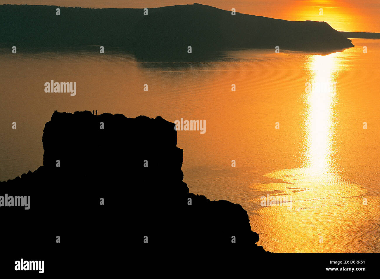 Greece, Cyclades, Santorini Island, Sunset over sea Stock Photo