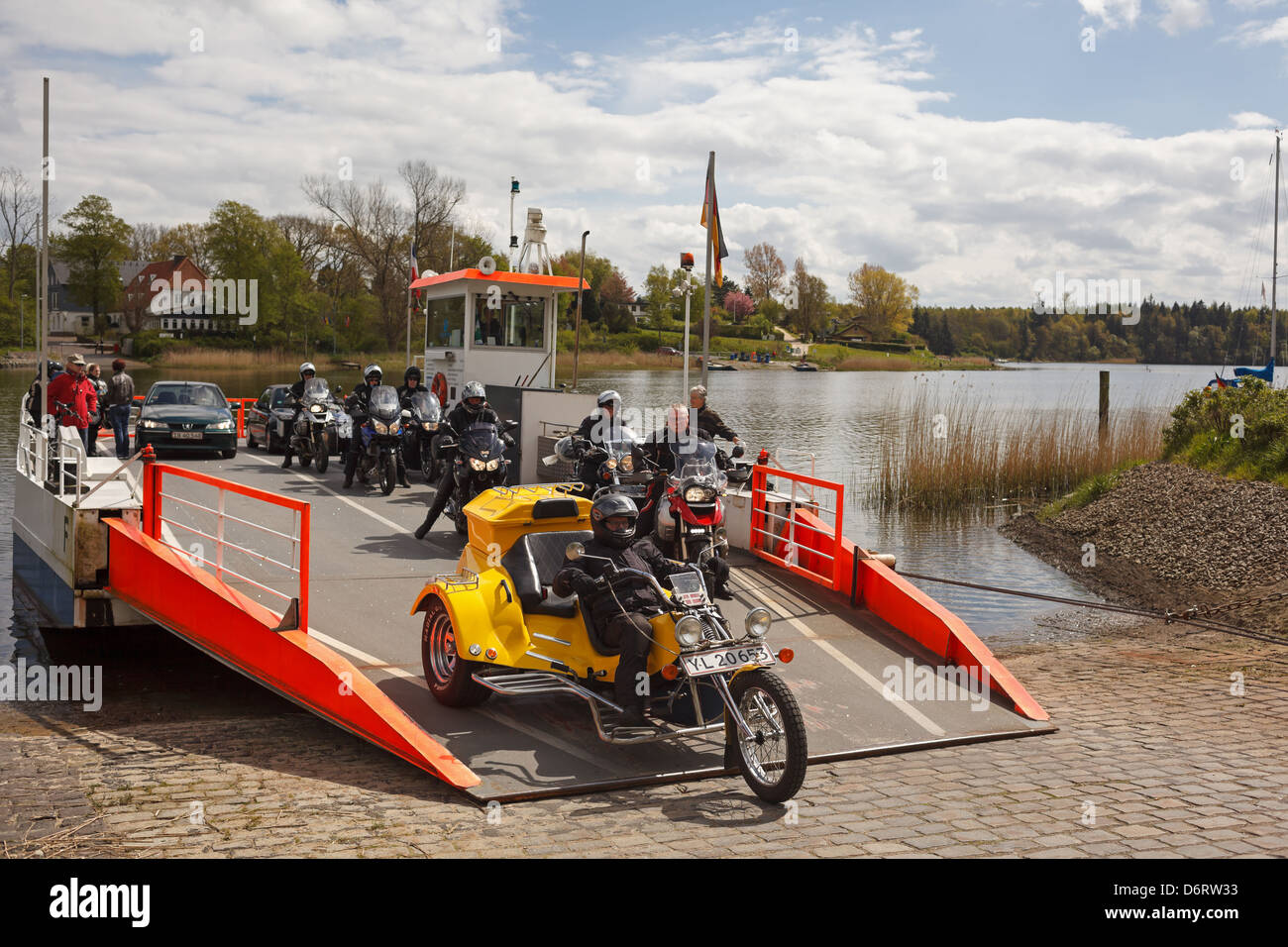 Missunde, Germany, Passengers leave the Missunder ferry after applying Stock Photo