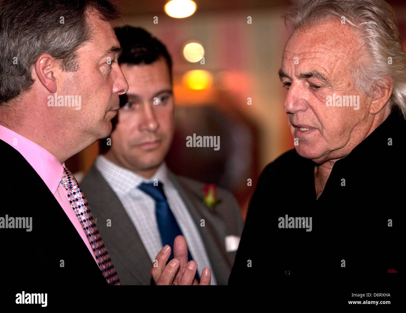Peter Stringfellow (R) talks to Nigel Farage (L) at Porters restaurant, today 23rd April 2012. UKIP press conference Stock Photo