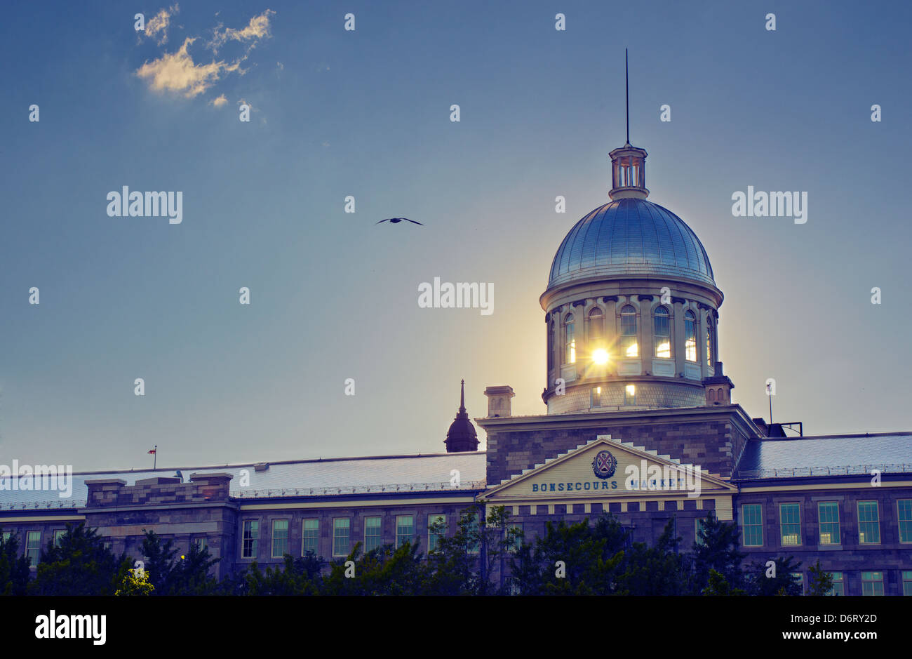 Backlighting picture at sunset of the Bonsecours Market in Montreal, Quebec, with the sun visible between the columns. Stock Photo