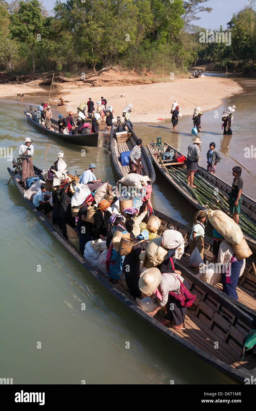 Villagers disembarking from boats, Inle Lake, near Indein and Nyaung Ohak villages, Shan State, Myanmar, (Burma) Stock Photo