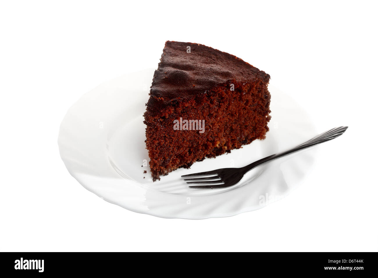Piece of chocolate cake on plate white background Stock Photo - Alamy
