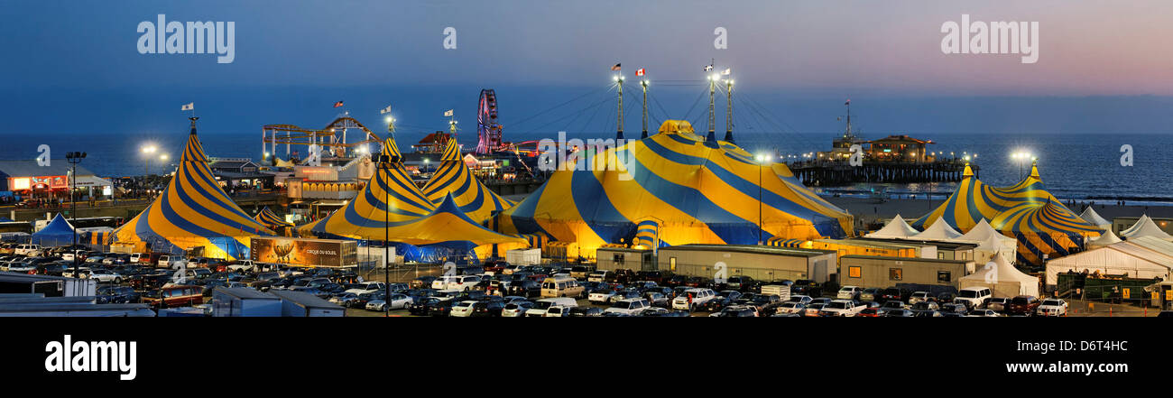 USA California Santa Monica Striking blue yellow tent tops Cirque du Soleil adorning Santa Monica Beach next Santa Monica Pier Stock Photo