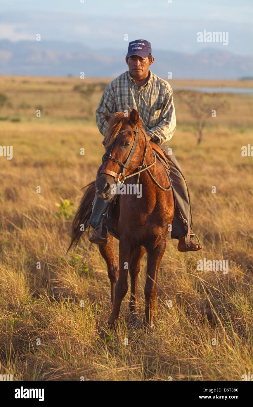 Horseman or Gaucho, barefoot; rider in the saddle. Karanambu Ranch ...