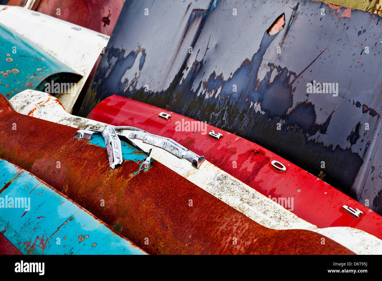 Stacked car hoods in wrecking yard Stock Photo Alamy