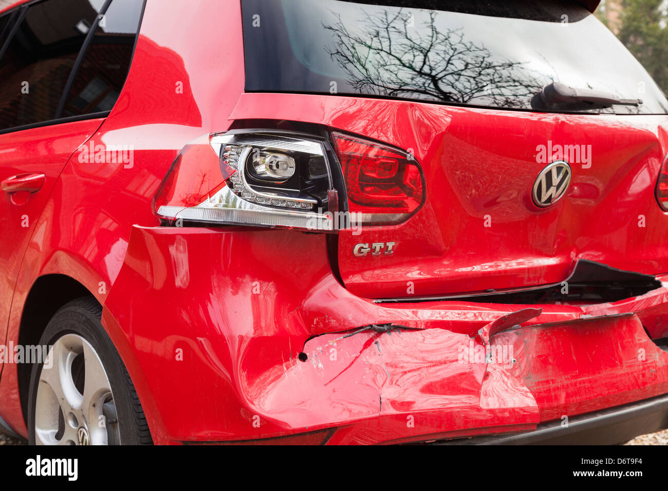 Red Volkswagen Golf GTI damaged in rear collision road accident Stock Photo  - Alamy