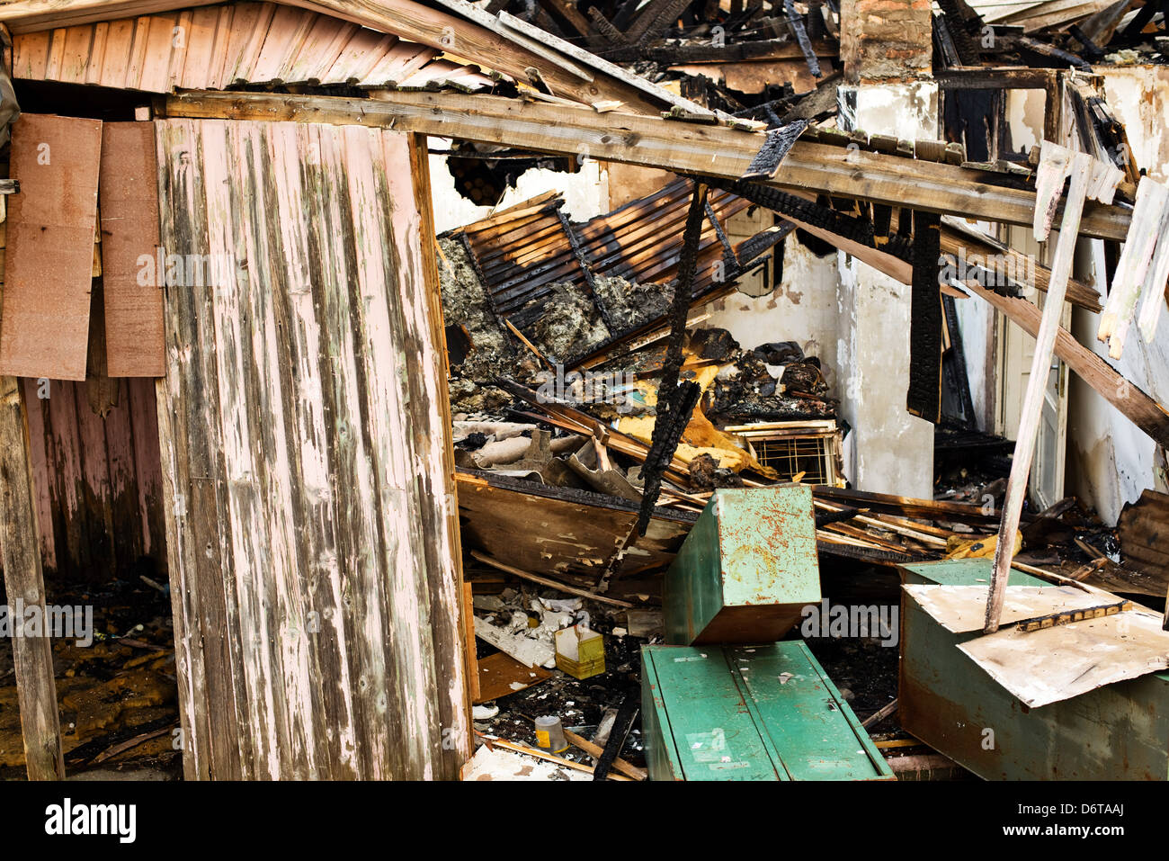 Burned down house, wooden home destroyed by fire Stock Photo Alamy