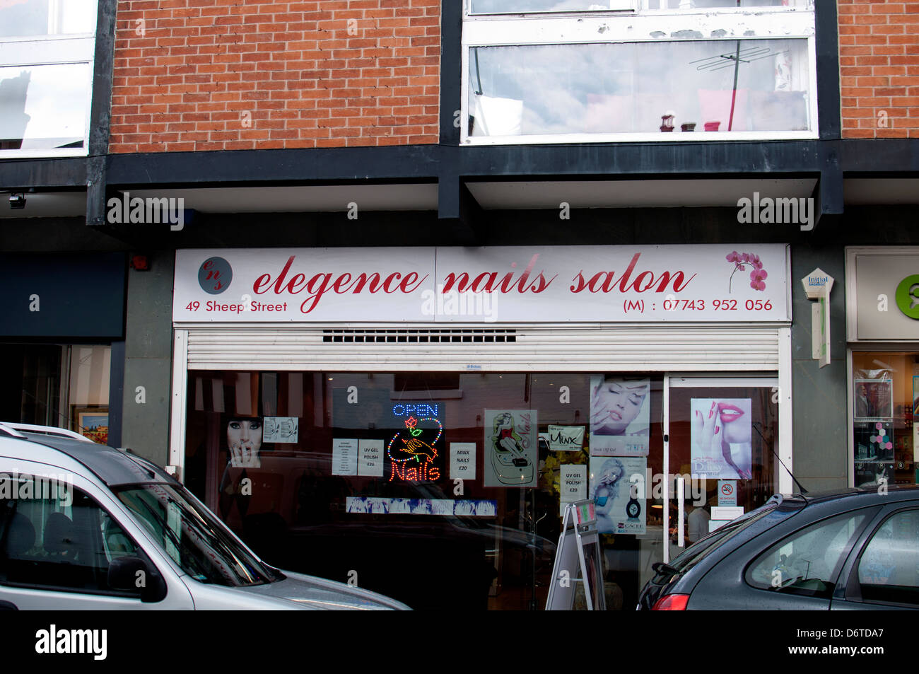 Spelling mistake on nails salon, elegence instead of elegance. Stock Photo