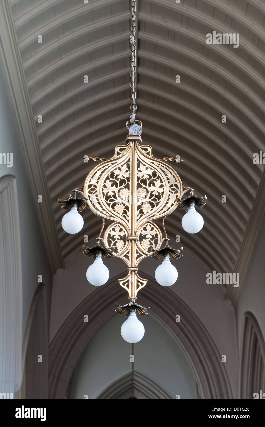 An ornate late Victorian hanging electric light fitting (electrolier
