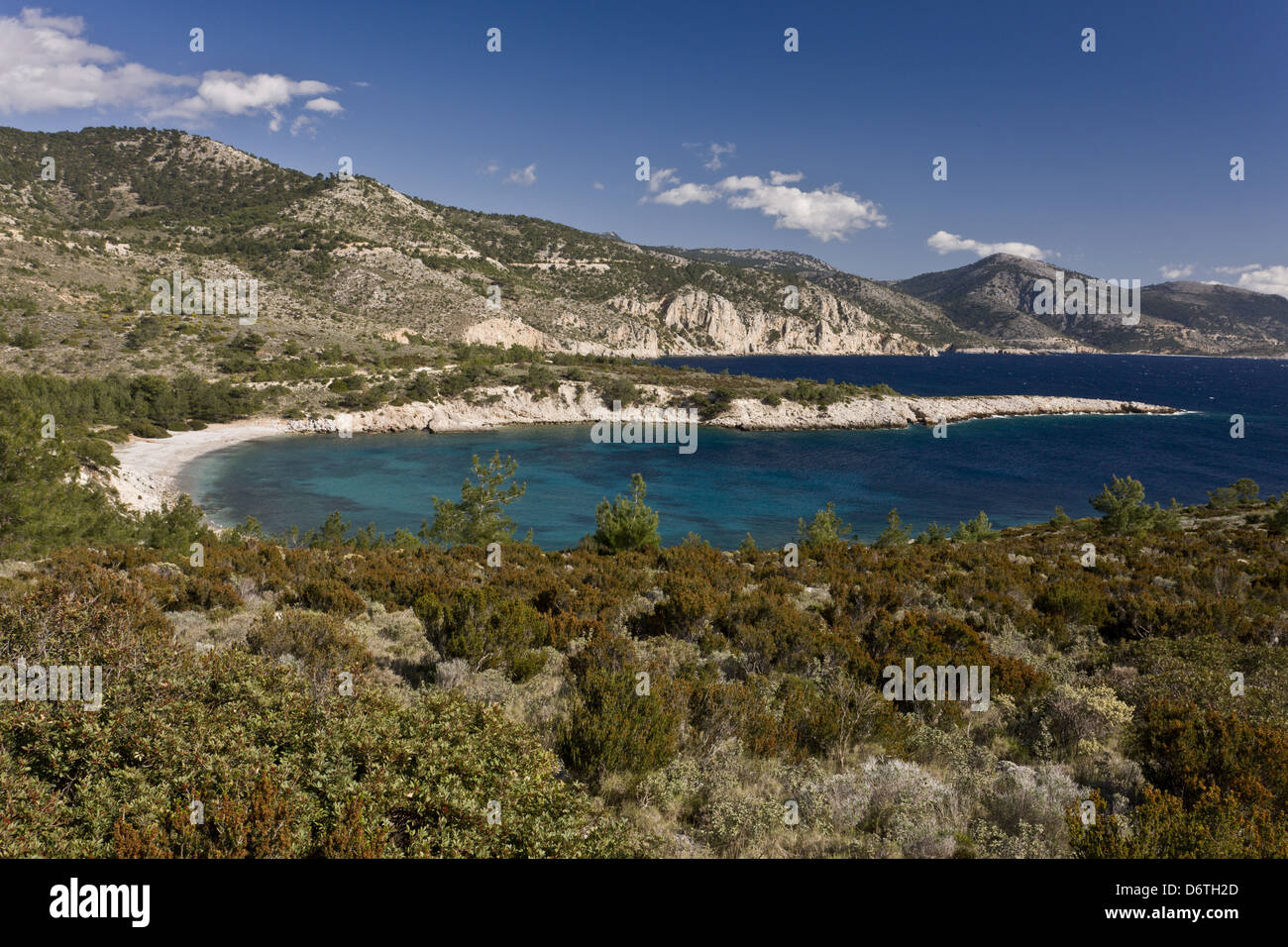View of coastline on unspoilt west coast of island, Tighani Bay, Chios, Greece, April Stock Photo