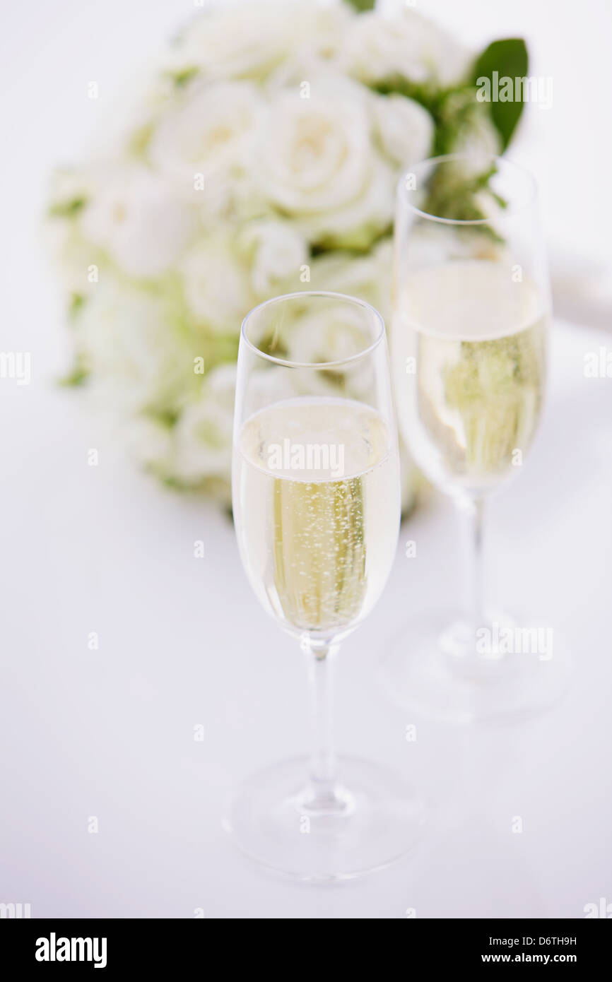 Wedding bouquet and sparkling wine Stock Photo