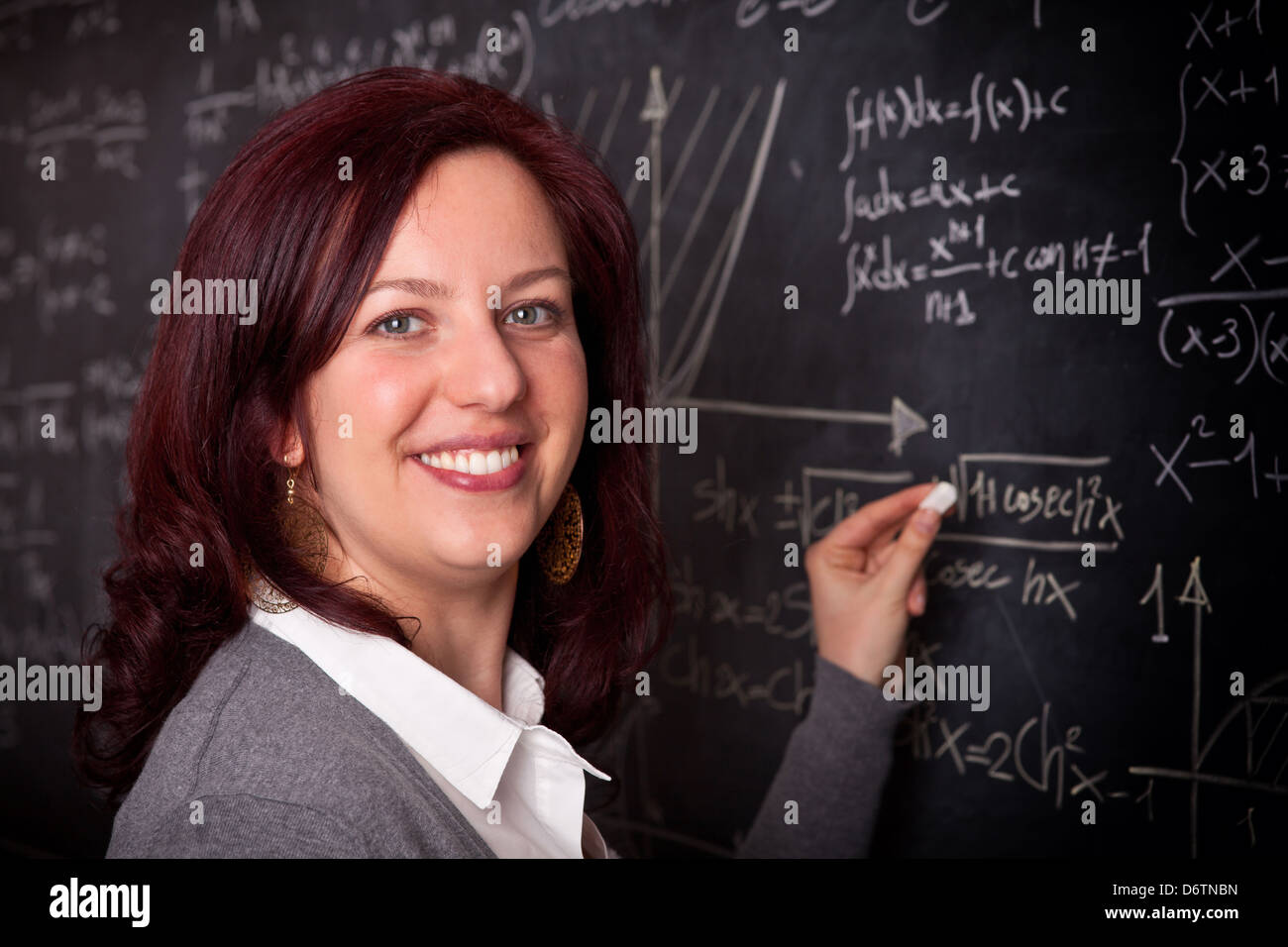portrait of woman teacher and blackboard background Stock Photo Alamy