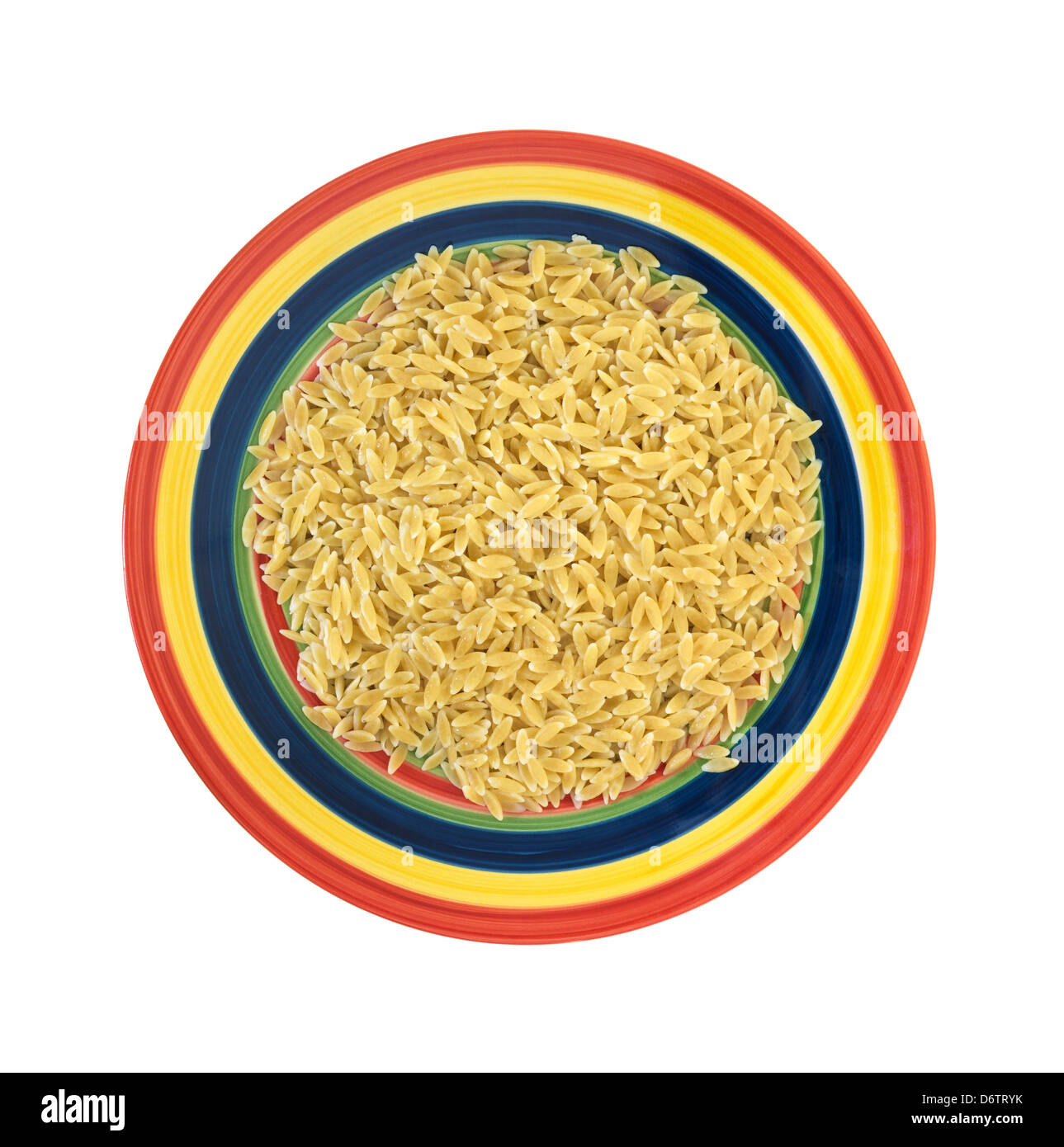 Top view of a large serving of cooked orzo pasta on a bright plate. Stock Photo