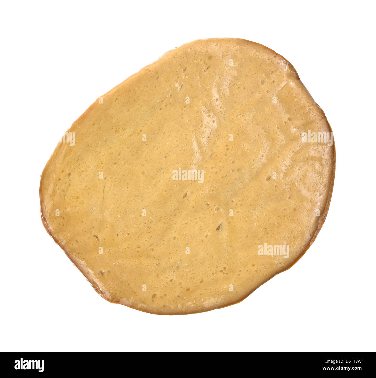 Top view of several slices of tofu meatless turkey luncheon meat on a white background. Stock Photo
