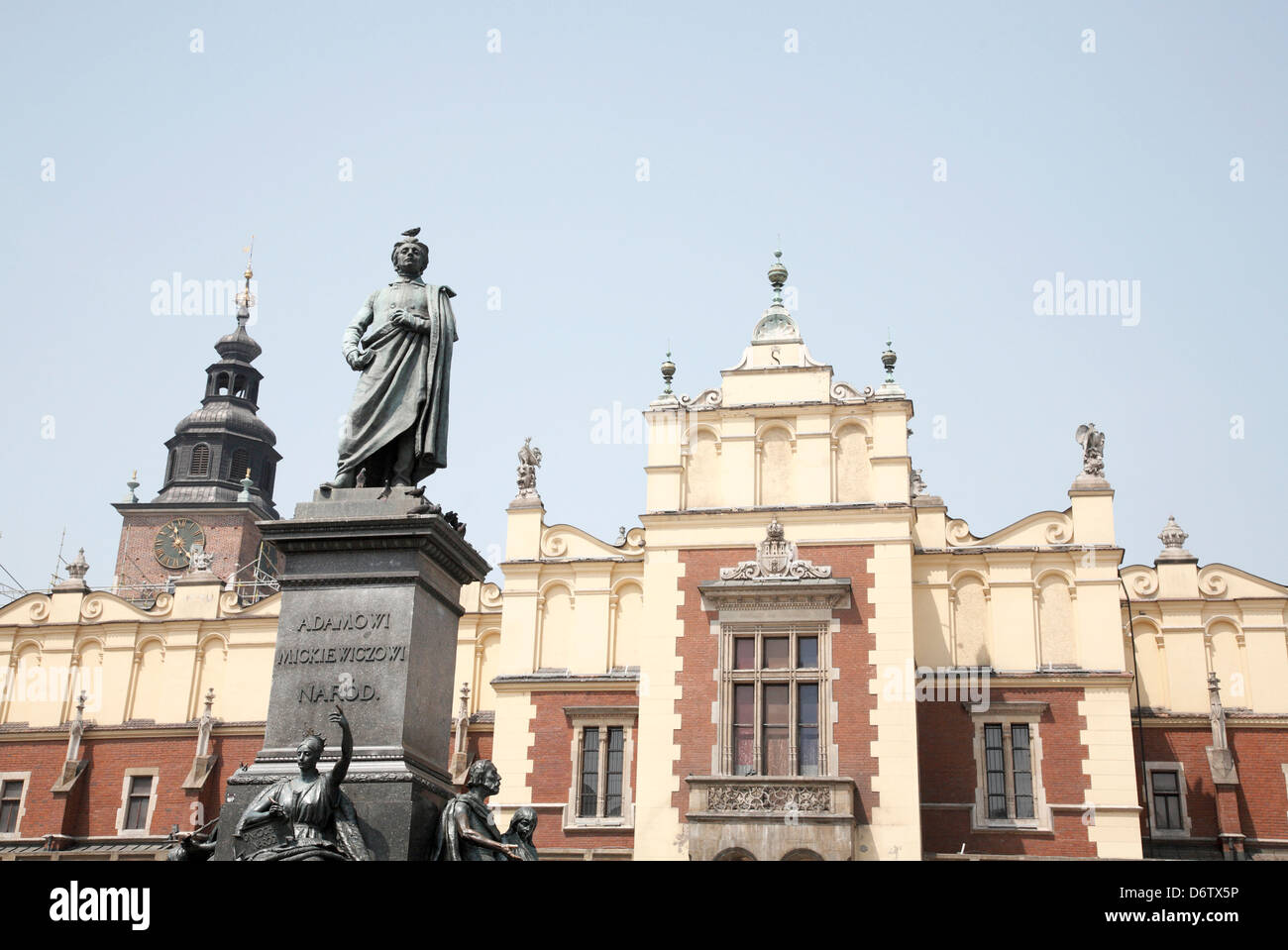 Statue of National Poet Adam Mickiewicz in front of Old Cloth Hall, Krakow, Poland Stock Photo