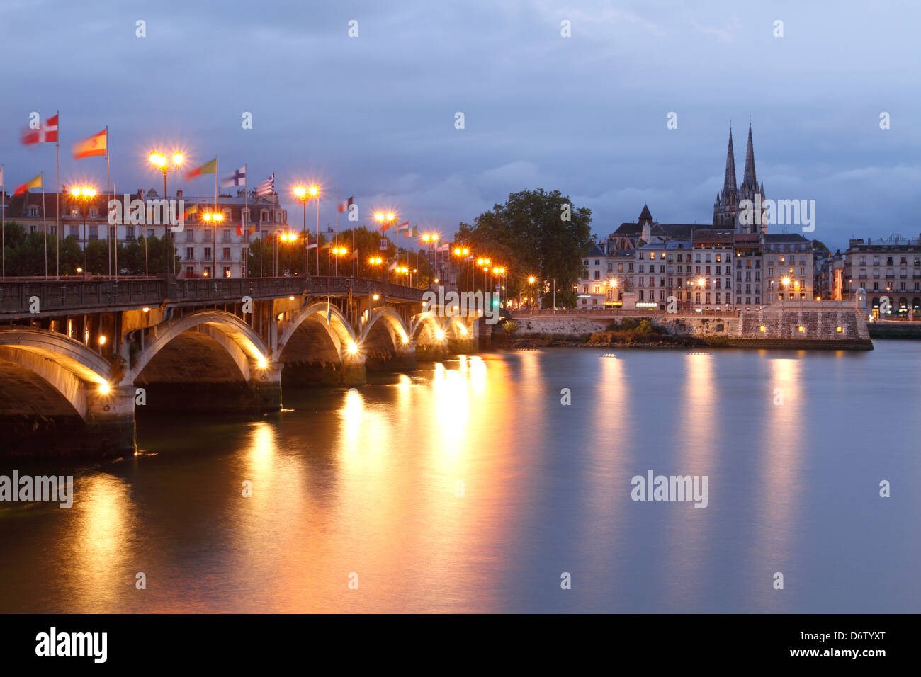 Night view of Bayonne, Aquitaine with the Adour River and bridge ...