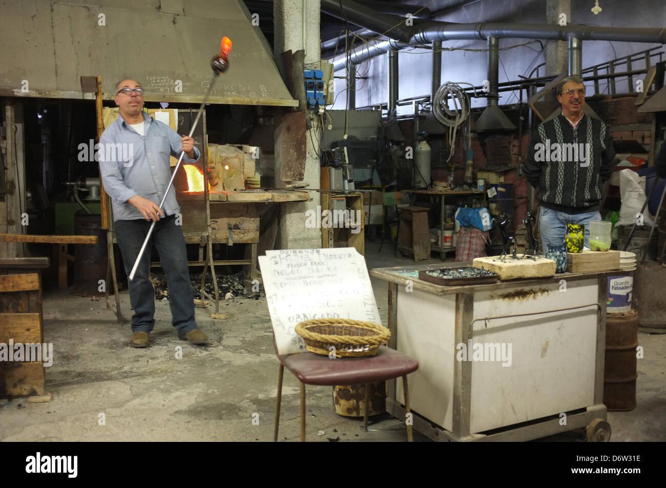 A glassblower in his on the island of Murano near Venice in