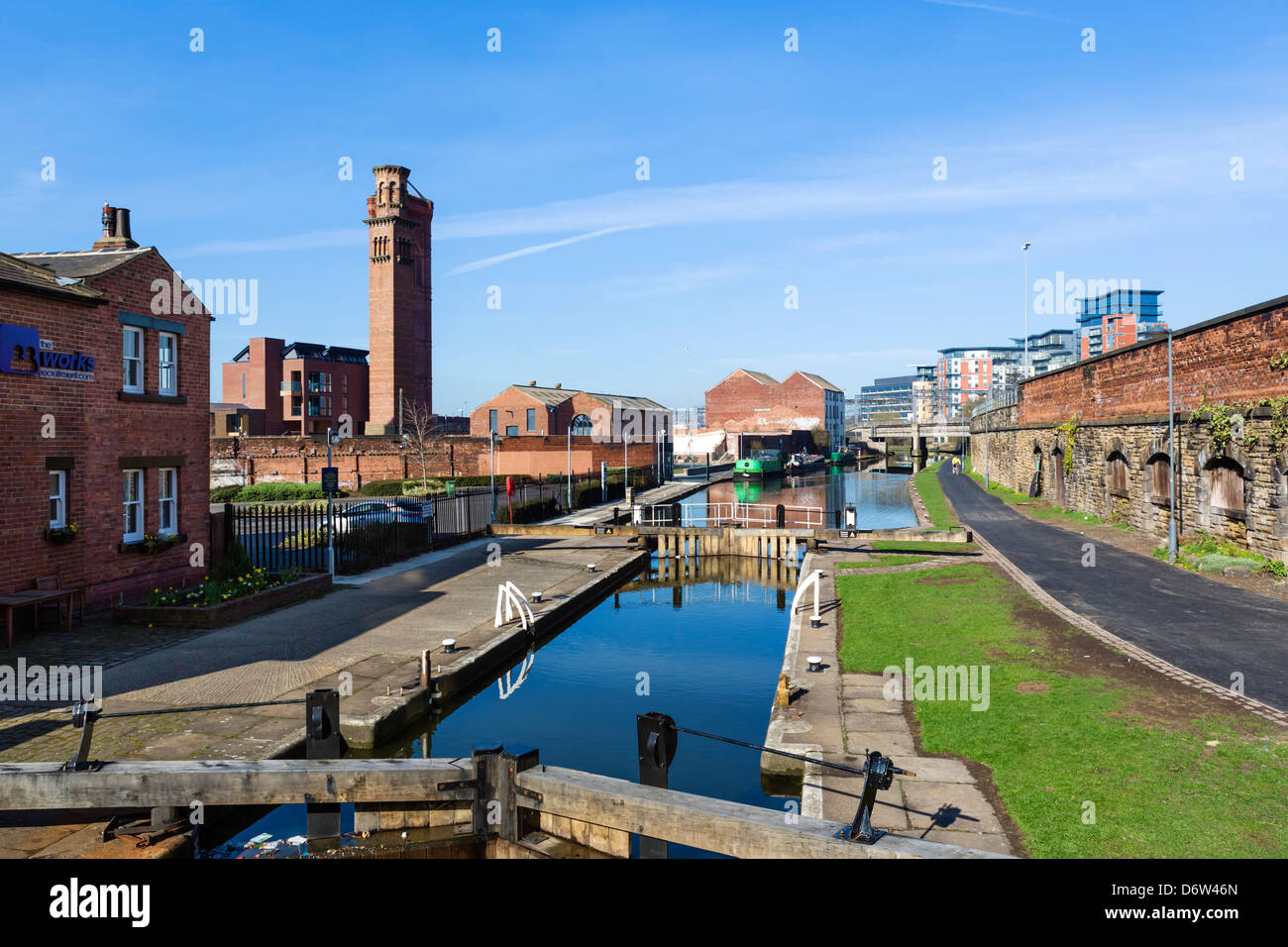 Lock on the Leeds to Liverpool Canal at Holbeck with famous campaniles of the Tower Works to the left, Leeds, West Yorkshire, UK Stock Photo
