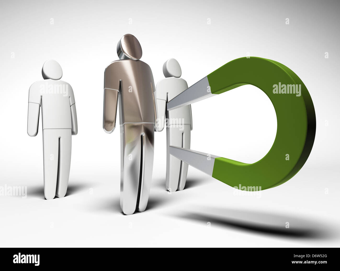 3 characters and one green horseshoe magnet attracting the one of them - grey background Stock Photo