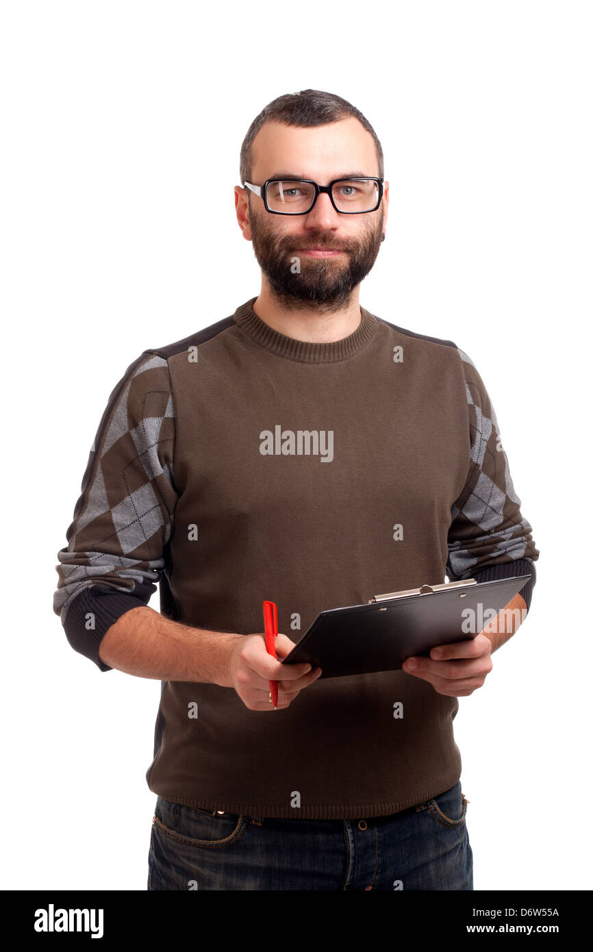 Young man writing on a clipboard Stock Photo - Alamy