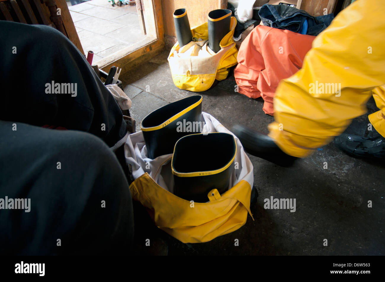 Fishermen dress for work. Stellwagen Banks, New England, United States, North Atlantic Ocean Stock Photo