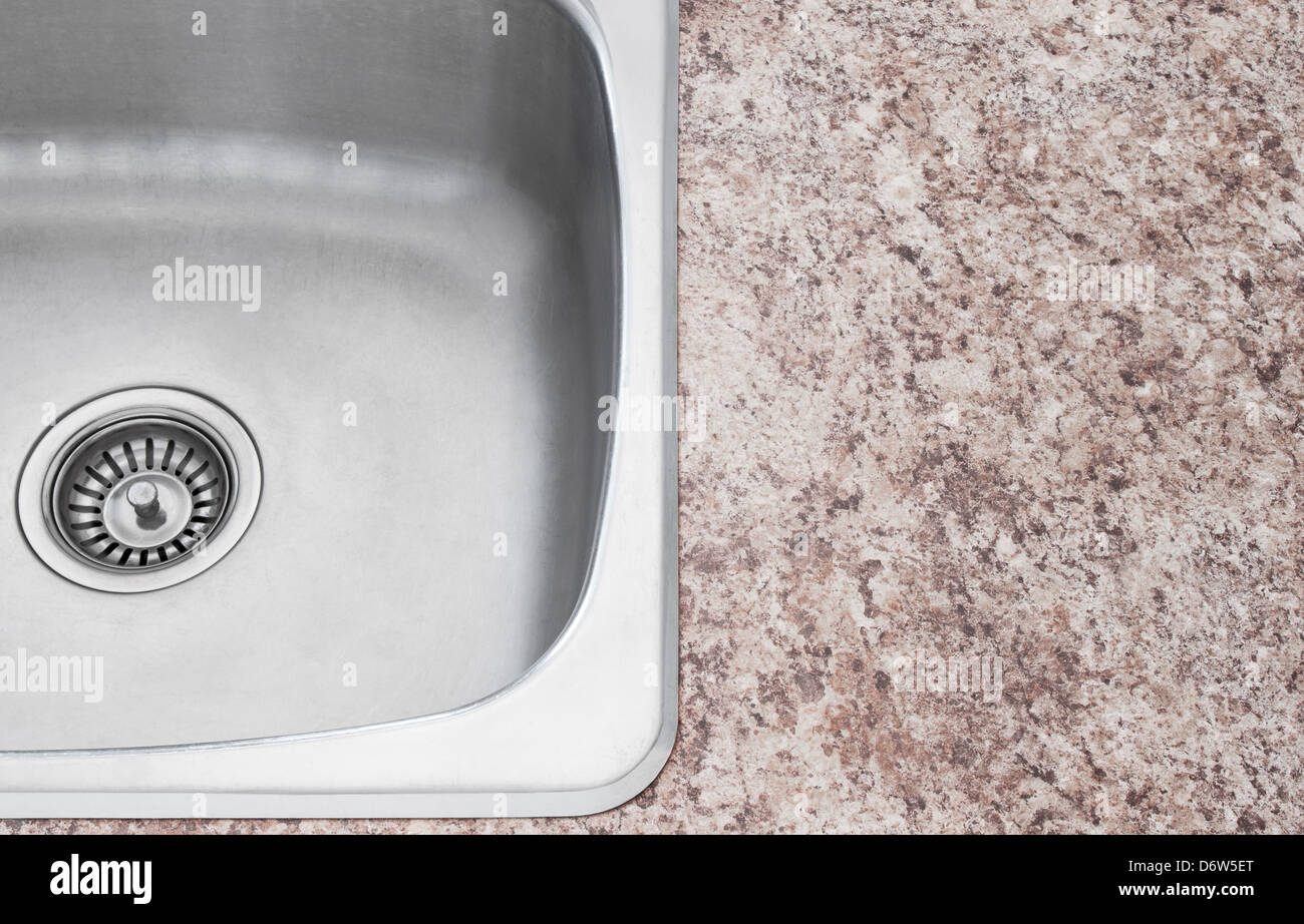 New shiny kitchen sink and countertop detail Stock Photo Alamy