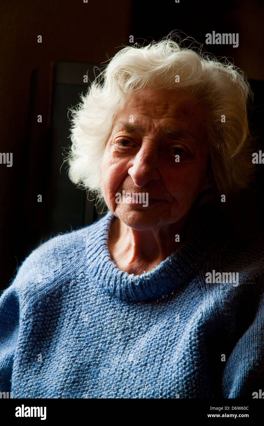 Portrait of old woman looking at the camera. Close view. Stock Photo