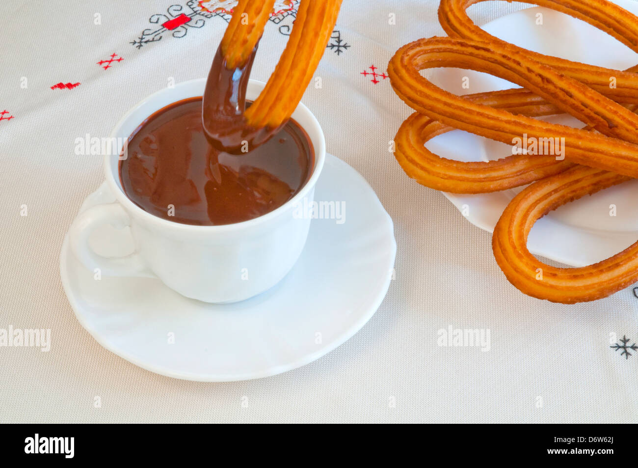 Chocolate with churros. Close view. Stock Photo