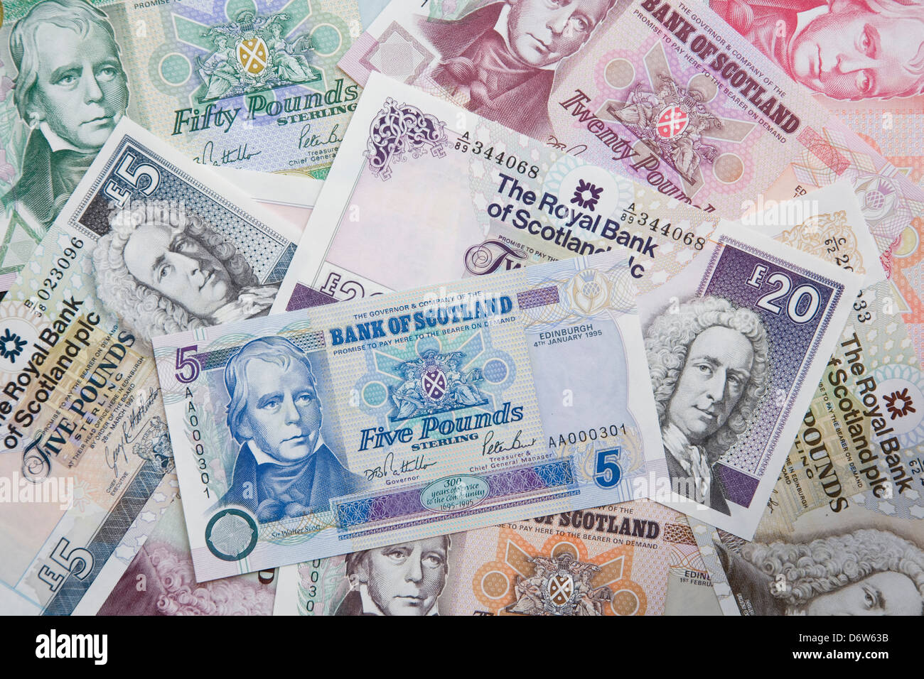 Scottish banknotes of varying denominations issued by the Bank of Scotland and Royal Bank of Scotland. Stock Photo