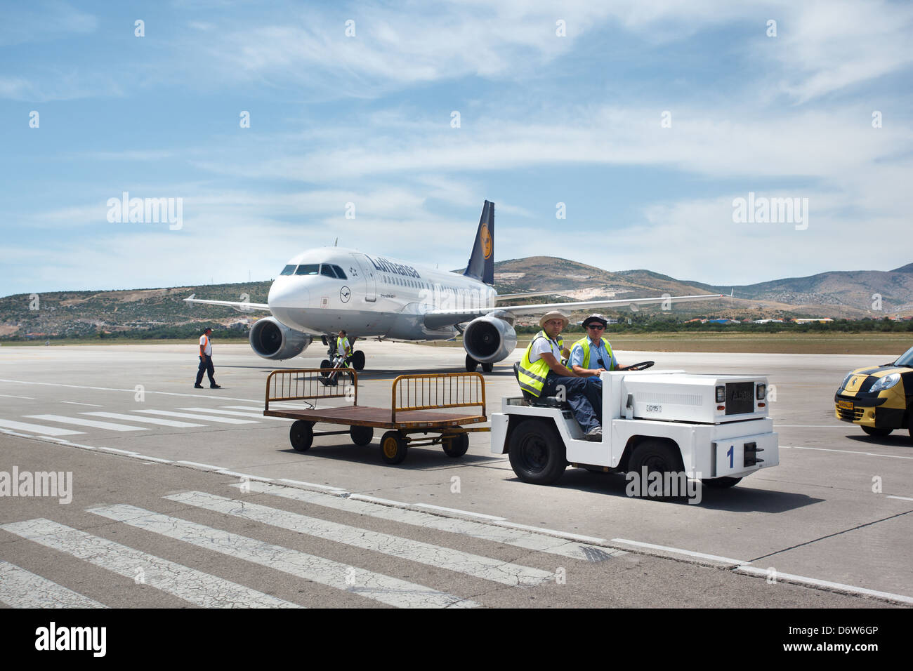 Kastela, Croatia, Baggage and Lufthansa plane at airport Split Kastela Stock Photo