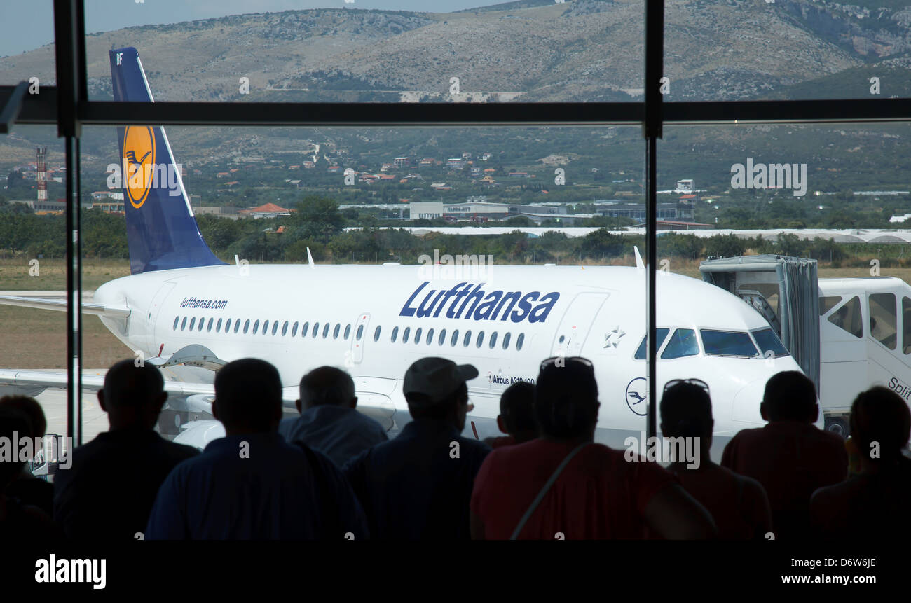 Kastela, Croatia, waiting passengers look at a Lufthansa aircraft at Split-Kastela Airport Stock Photo