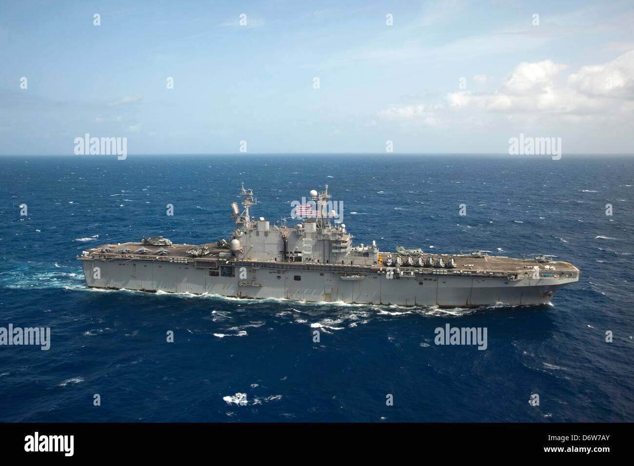 US Navy Amphibious assault ship USS Peleliu during operations April 23, 2013 in the Pacific Ocean. Stock Photo