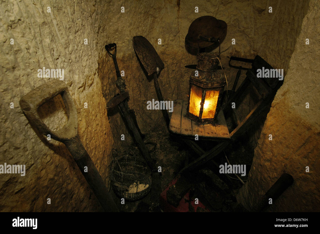 Digging tools displayed inside the 12 meter rock-hewn underground air-raid shelter used by locals during the WWII bombings of Malta in the town of Mgarr formerly known as Mgiarro, a small town in the Northern Region of Malta Stock Photo