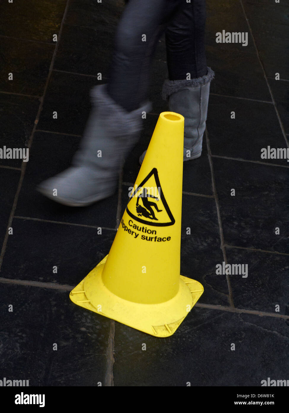 Slippery when wet warning Stock Photo