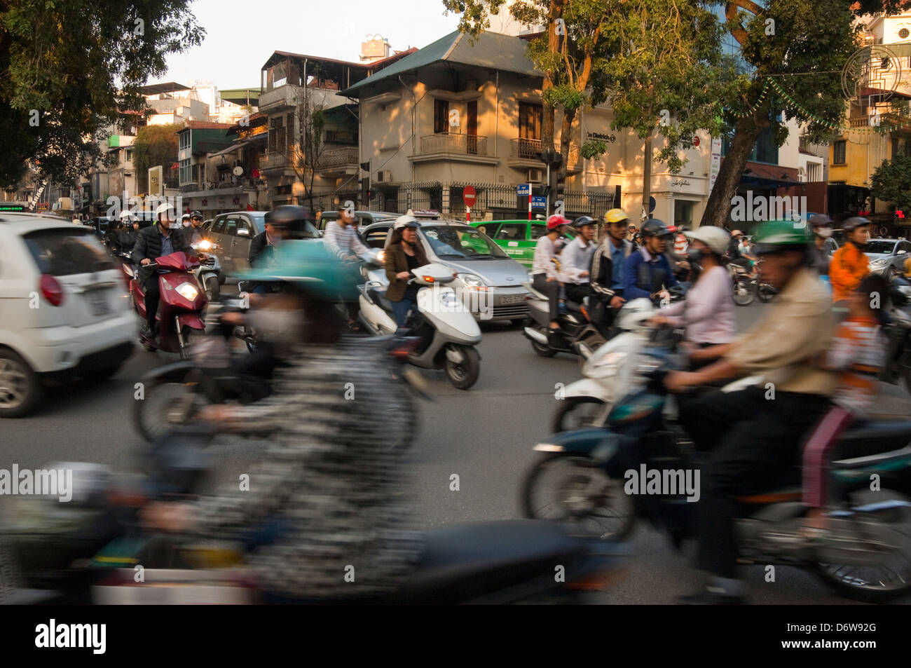 Directions During Rush Hour Horizontal Cityscape Of A Busy Crossroads In Hanoi With Lots Of Mopeds  Driving In All Directions During Rush Hour Stock Photo - Alamy