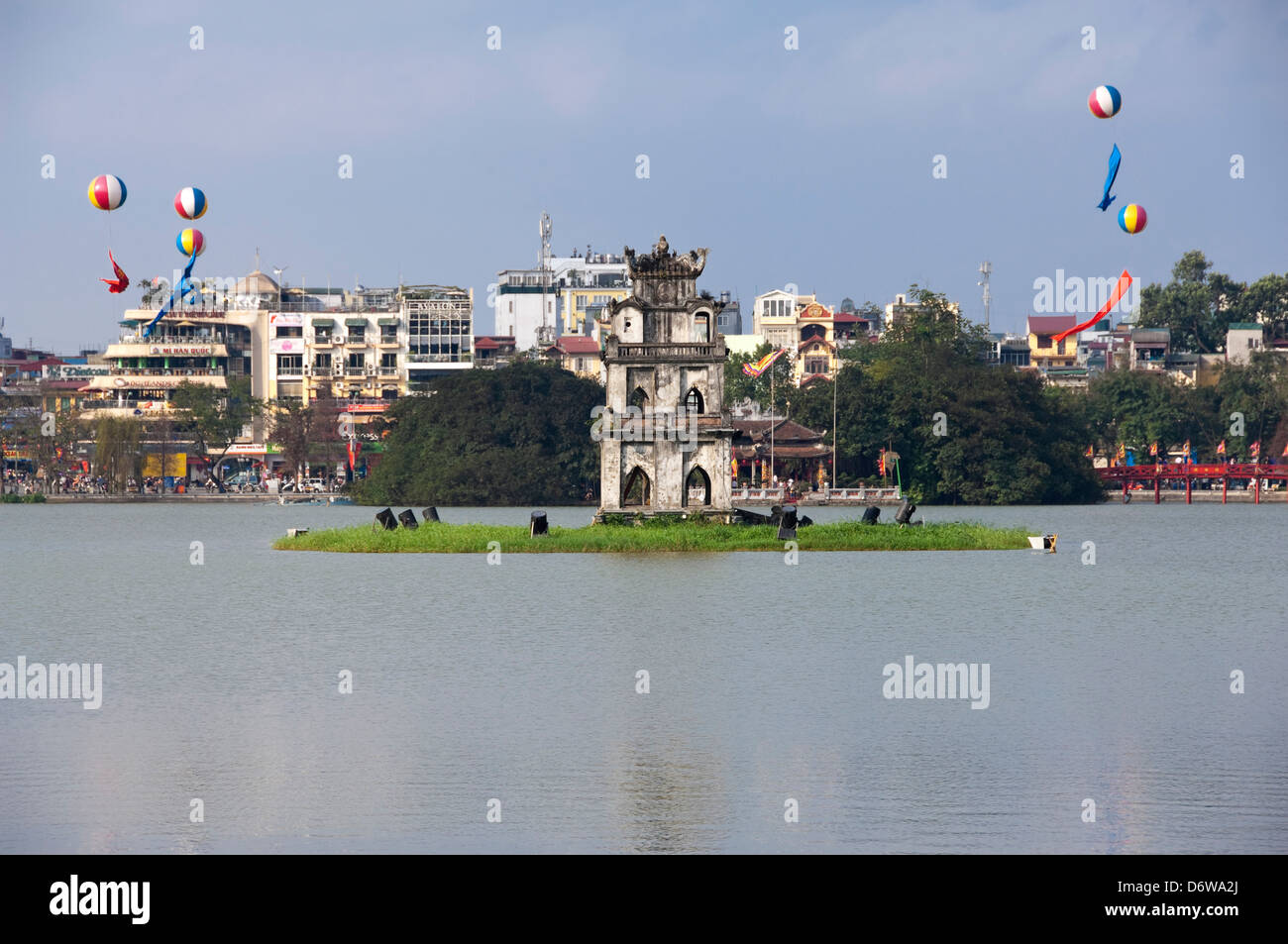 Horizontal view of Thap Rua, Tháp Rùa aka Turtle Tower in the middle of Hoan Kiem Lake in Hanoi on a sunny day. Stock Photo
