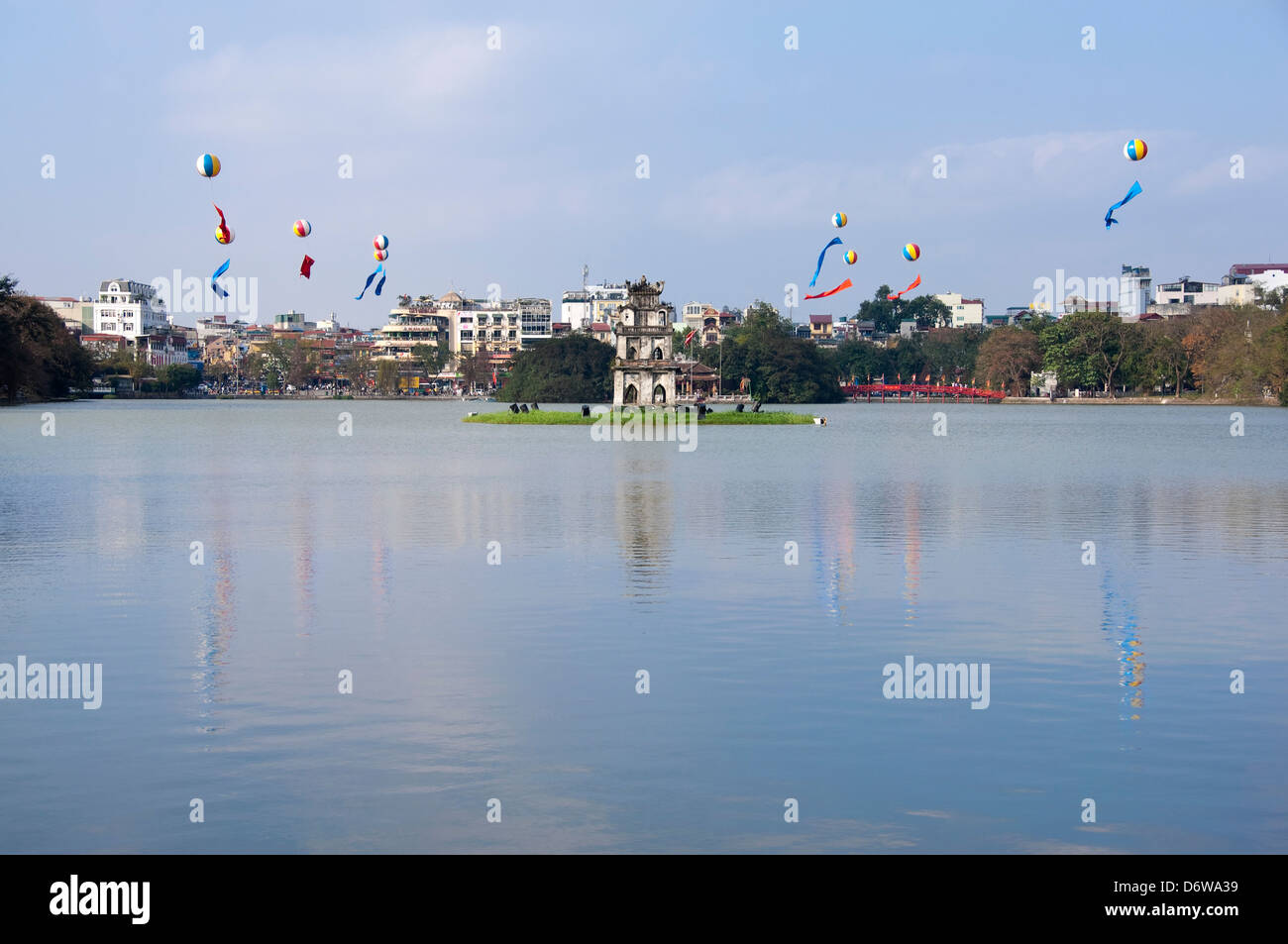 Horizontal view of Thap Rua, Tháp Rùa aka Turtle Tower in the middle of Hoan Kiem Lake in Hanoi on a sunny day. Stock Photo