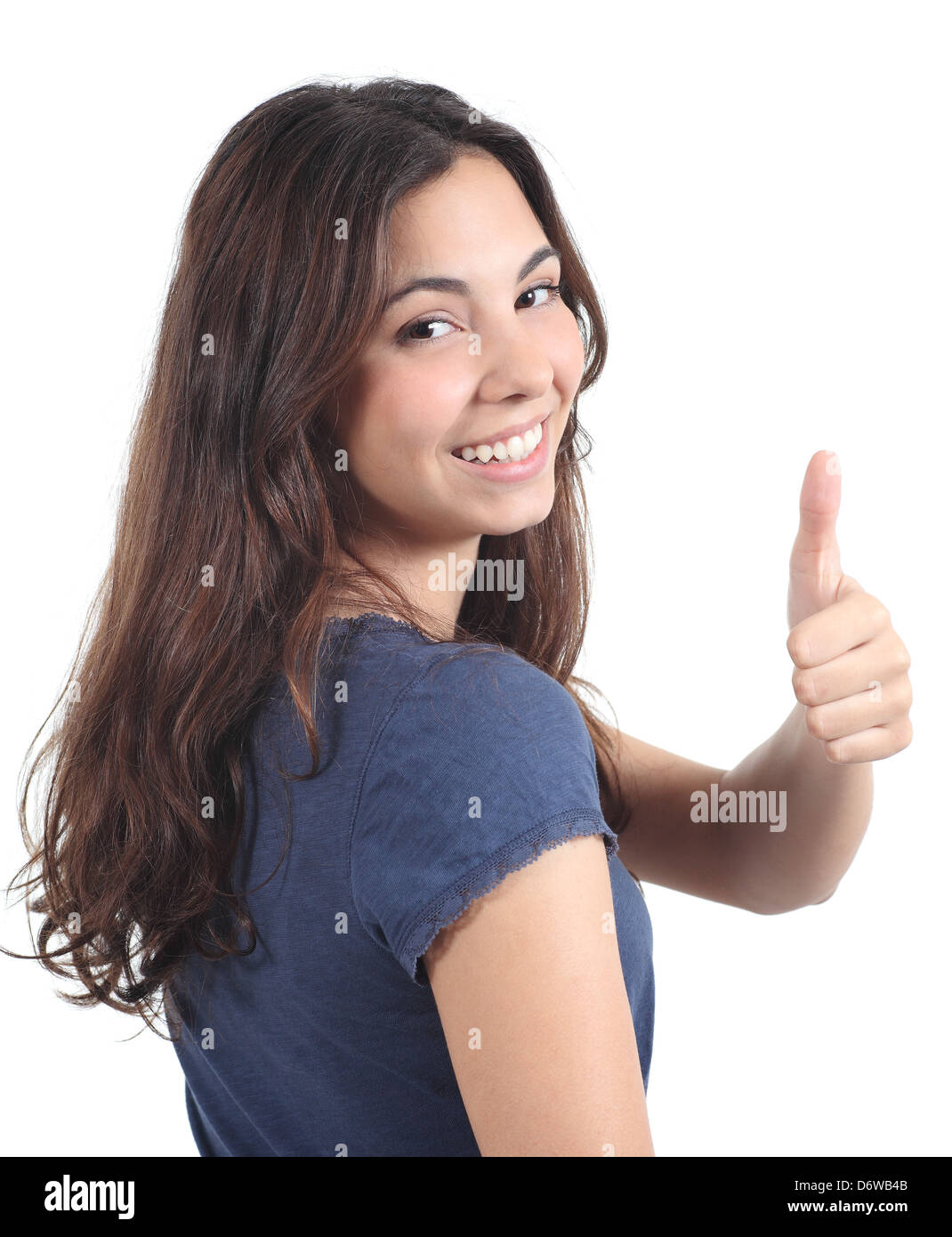 Back view of a beautiful teen with thumb up gesture on a white isolated background Stock Photo