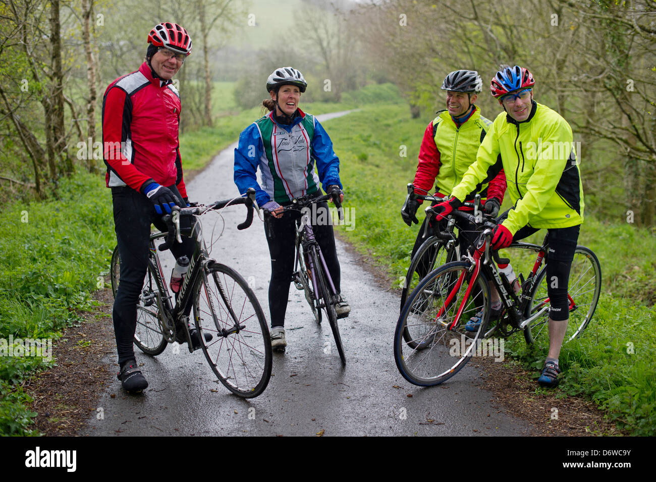 Four cyclists on the Tarka Trail, in North Devon, between Torrington and East Yard. Stock Photo