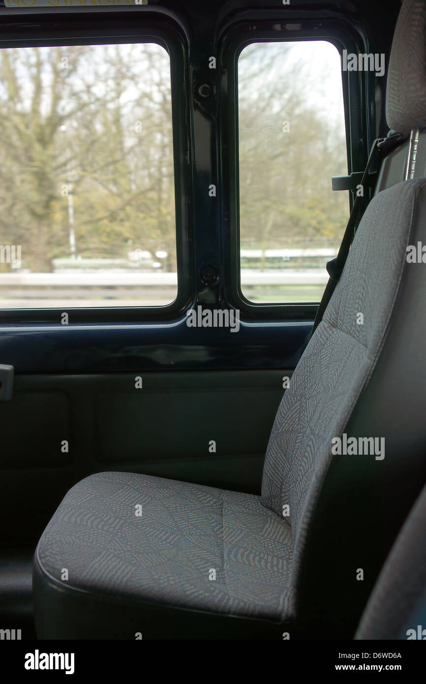 coach mini bus car seat cloth window highway Stock Photo