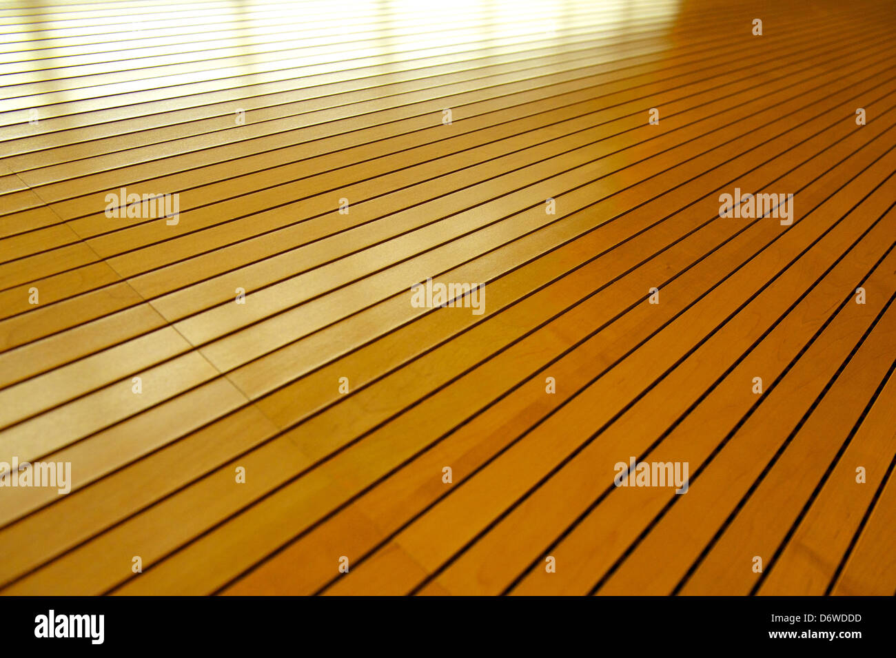 Row Slats Rows of tightly fitted wooden slats form disappear into infinity with ...