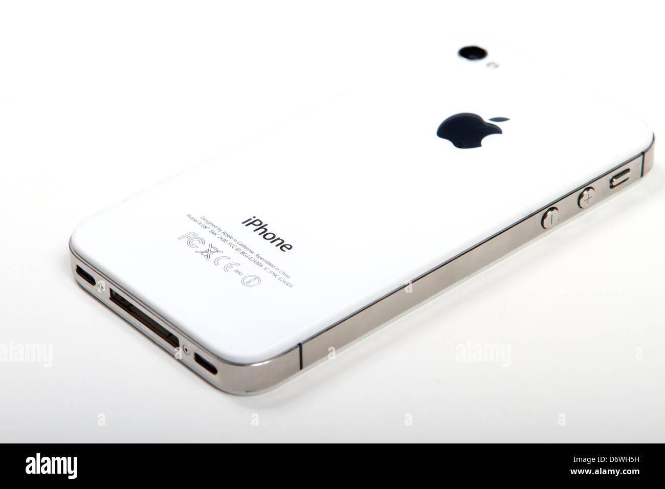 White Apple iphone 4S rear view on white background Stock Photo